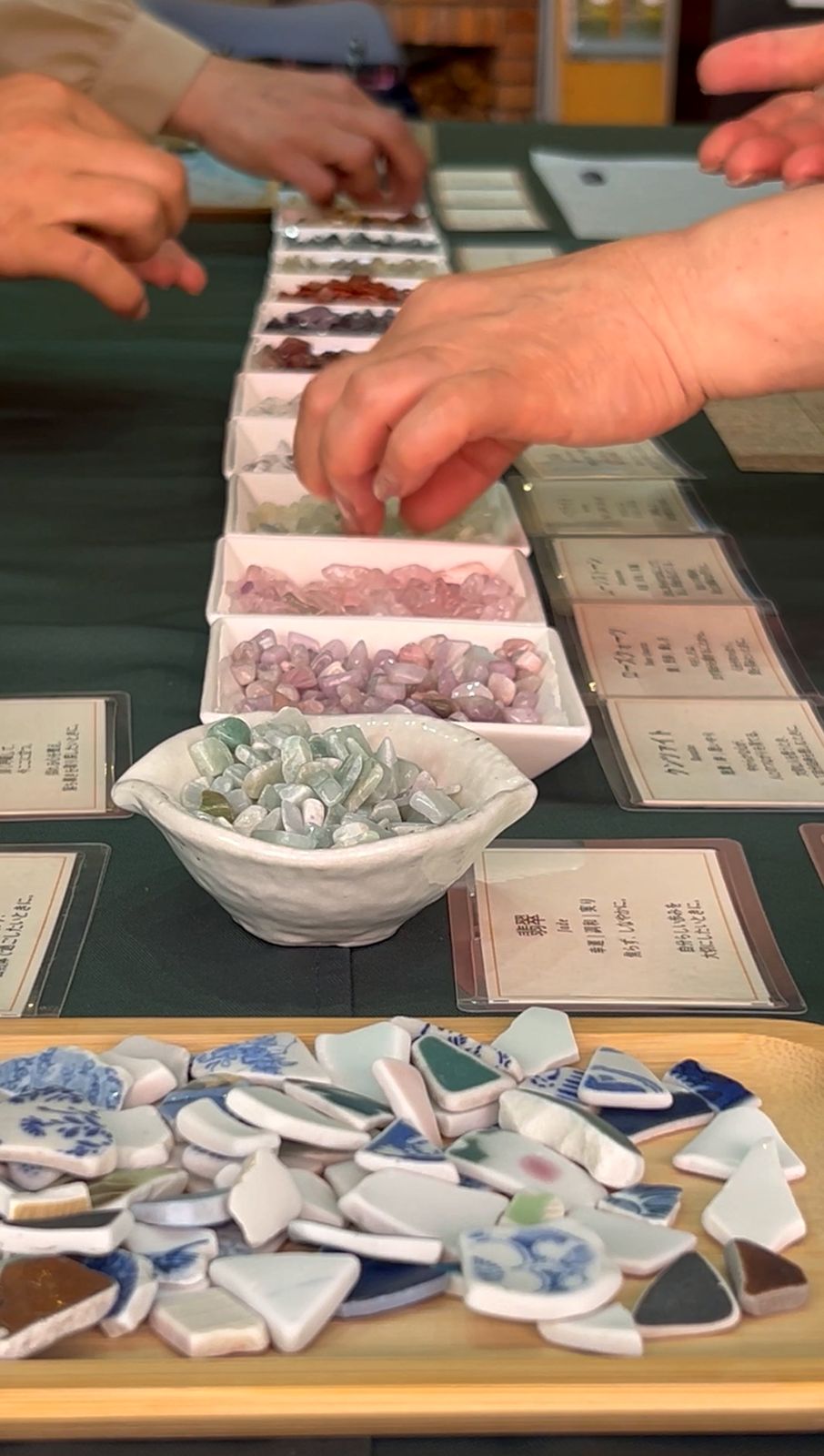 Picking a stone from the tray