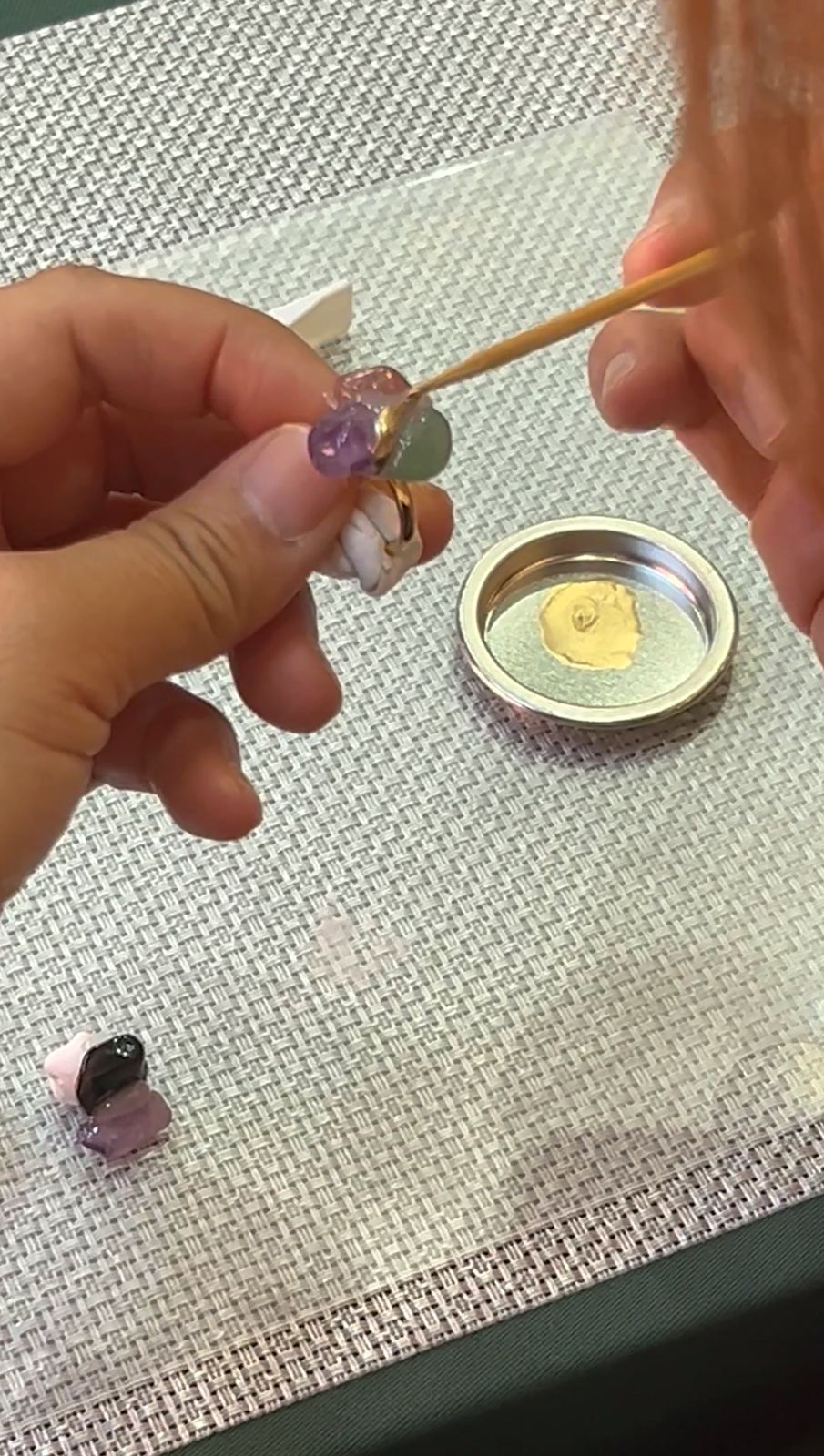 Fine work with gold and a bamboo pick